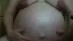 ugly preggo pig in webcam