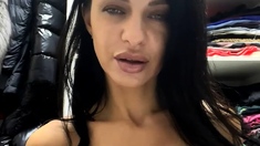 Busty curly brunette with big boobs fucks on couch