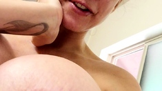 Busty curly brunette with big boobs fucks on couch