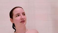 Busty curly brunette with big boobs fucks on couch