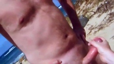 Beach Handjob for a Big Dick
