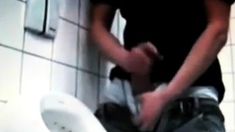azeri Jerking huge cock at public toilet